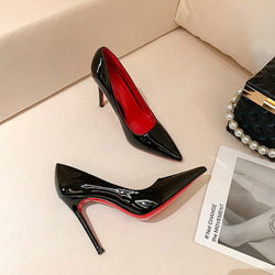 Black women's stiletto pumps with red background, high heel design, solid color pattern, suitable for daily wear.