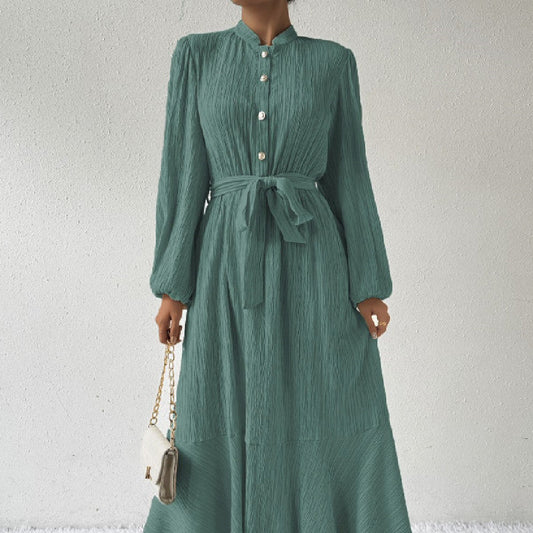 Women's fashion graceful self-tie dress in green with high waist and long sleeves.
