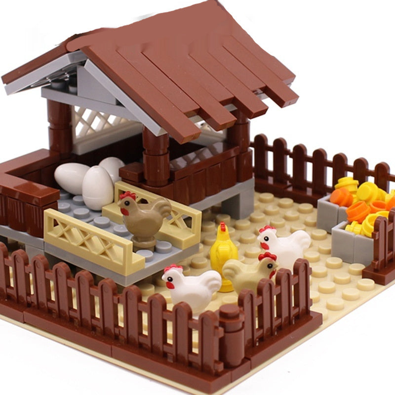 Small particle building blocks animal farm scene with chicken coop and accessories.