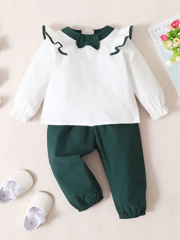 Children's contrast ruffled top and pants set with bow detail in white and green cotton
