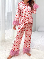 Heart print button up top and pants lounge set with pink fringe cuffs and hem, 100% polyester, slightly stretchy, two-piece pajama set