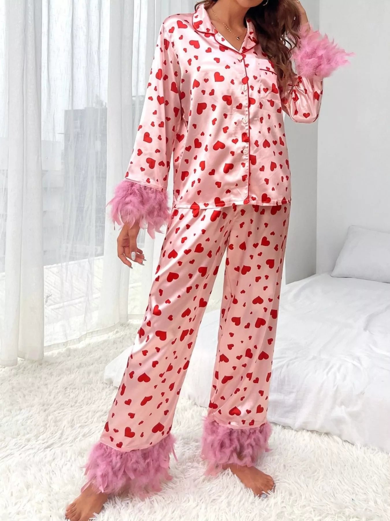 Heart print button up top and pants lounge set with pink fringe cuffs and hem, 100% polyester, slightly stretchy, two-piece pajama set