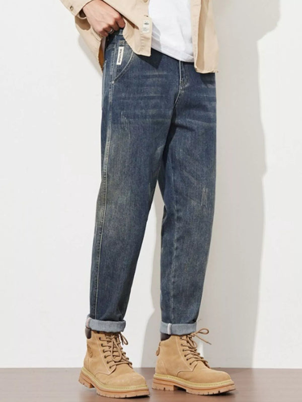 Men's washed loose fit jeans with slight stretch and rolled cuffs