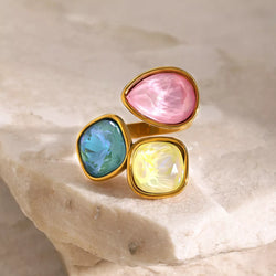 Triple Rhinestone Bypass Ring with pink, blue, and yellow stones set in 18K gold-plated stainless steel