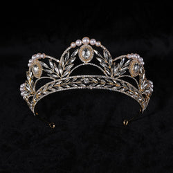 Alloy electroplate crown with intricate design, featuring imitation gold finish and decorative pearls, ideal for fashion-forward women.