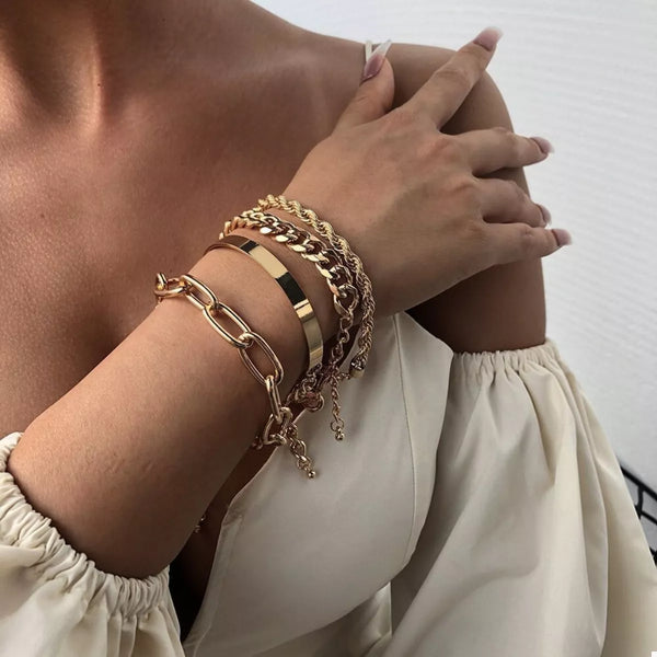 4 piece 18K gold-plated minimalist bracelets on wrist