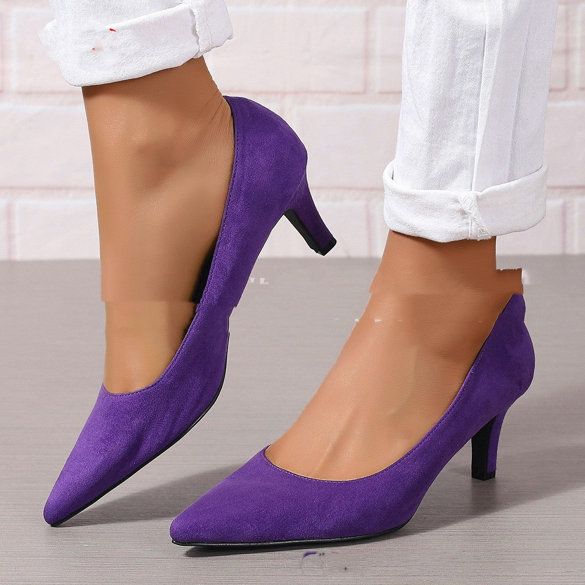 Fashion ladies purple stiletto heel slip-on pumps.