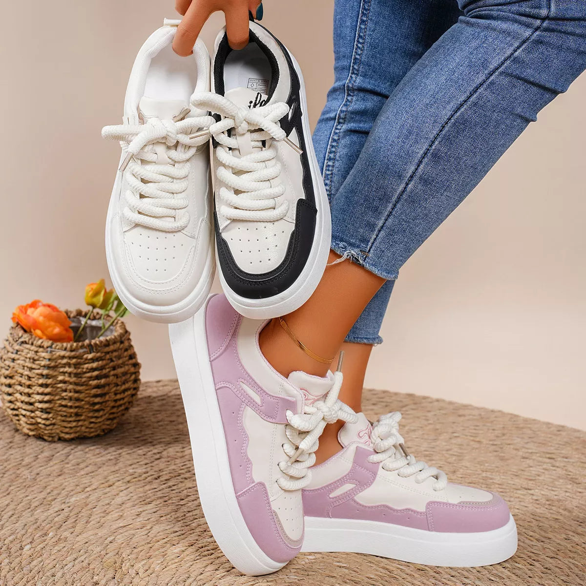 Round toe platform sneakers in white, black, and pink color options, made of PU leather with mid-height rubber soles.