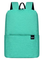 Solid color nylon backpack in medium size with simple design and front pocket