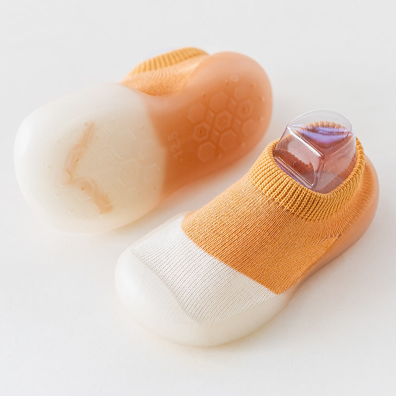 Baby toddler waterproof early education socks, color block orange, cotton composition, short tube, neutral design.