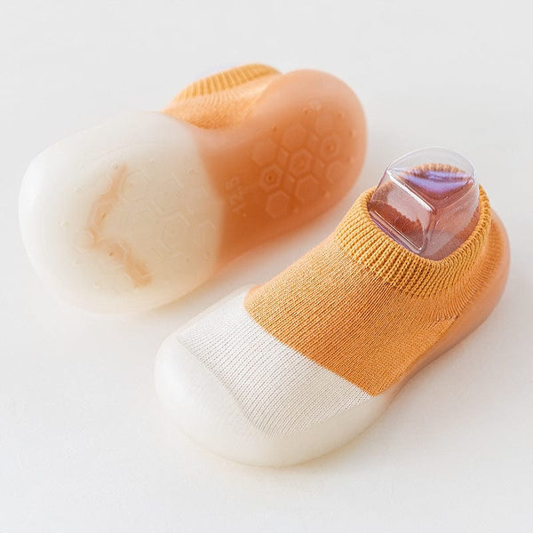 Baby toddler waterproof early education socks, color block orange, cotton composition, short tube, neutral design.