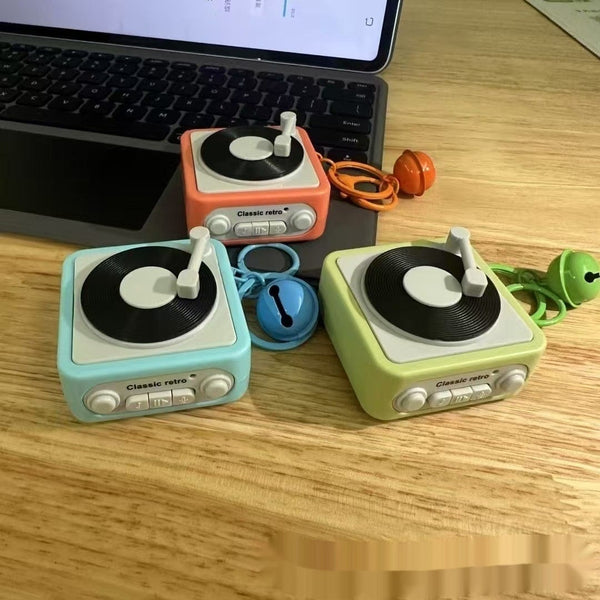Girls' bag solid color phonograph pendants in orange, blue, and green with keychain.