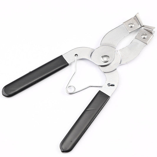 Piston ring expander repair tool with black handles.