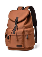 Large brown canvas backpack with multi pockets and adjustable strap