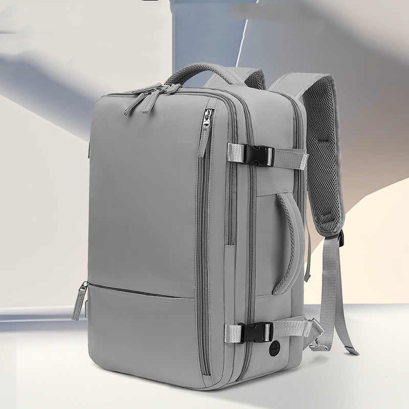 Versatile gray backpack for girls made from waterproof Oxford cloth.
