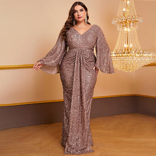 Women's sequin long-sleeved V-neck pleated dress in camel, featuring ruffle sleeves and an elegant hip skirt design.