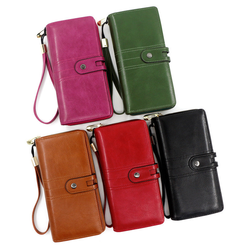 Long business wallet for women in black, wine red, green, rose red, and brown colors, made of polyester.