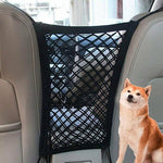 Black premium pet car net installed between front seats with dog nearby