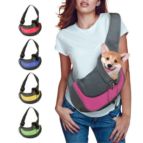 Pet carrier shoulder bag with breathable mesh and adjustable strap carrying a small dog in pink and other color options